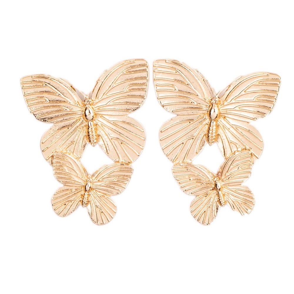 Gold butterfly earring.